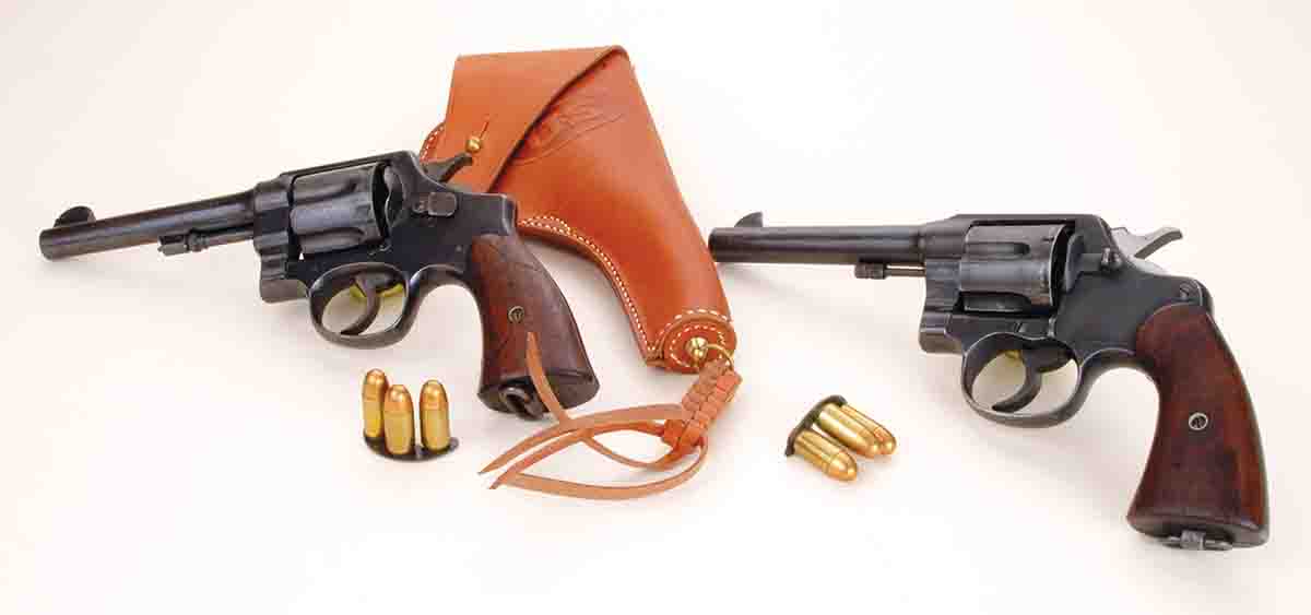 S&W (left) and Colt (right) Model 1917 revolvers with three shot, half-moon clips.